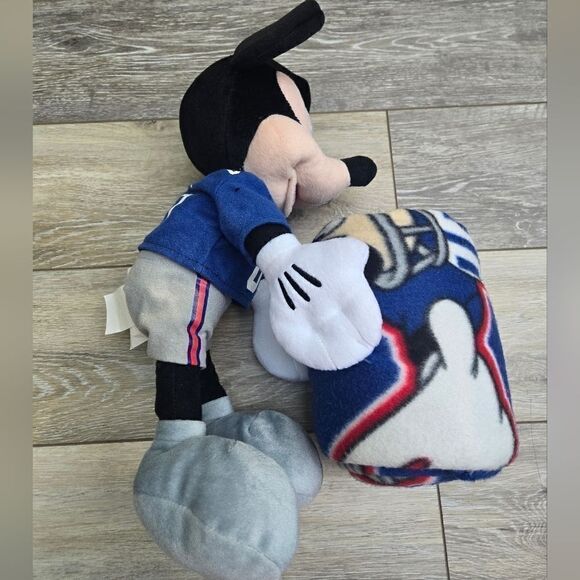Giants blanket with Disney's Mickey plush hugging it - Picture 3 of 12